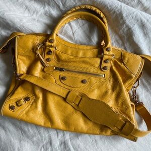 Balenciaga city bag, yellow leather with rose gold hardware.